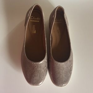 Leather Clarks shoes.